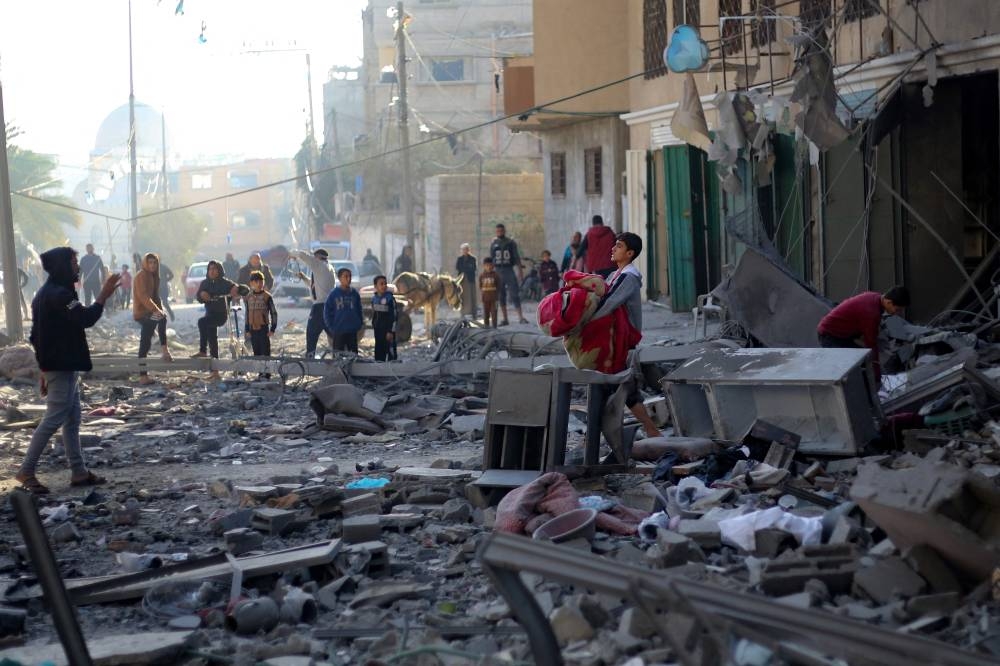 Aumentan a más de 21,800 los muertos palestinos por los ataques de ...