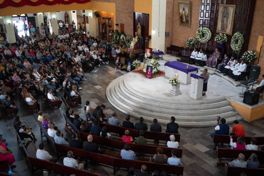 Las cenizas de Paquita en la iglesia Cristo Rey, en Alto Lucero. Photo by VICTORIA RAZO / AFP