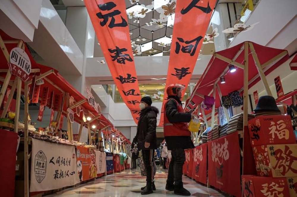 Las calles de Pekín se llenan de pesimismo por el freno económico: «No hay dinero»